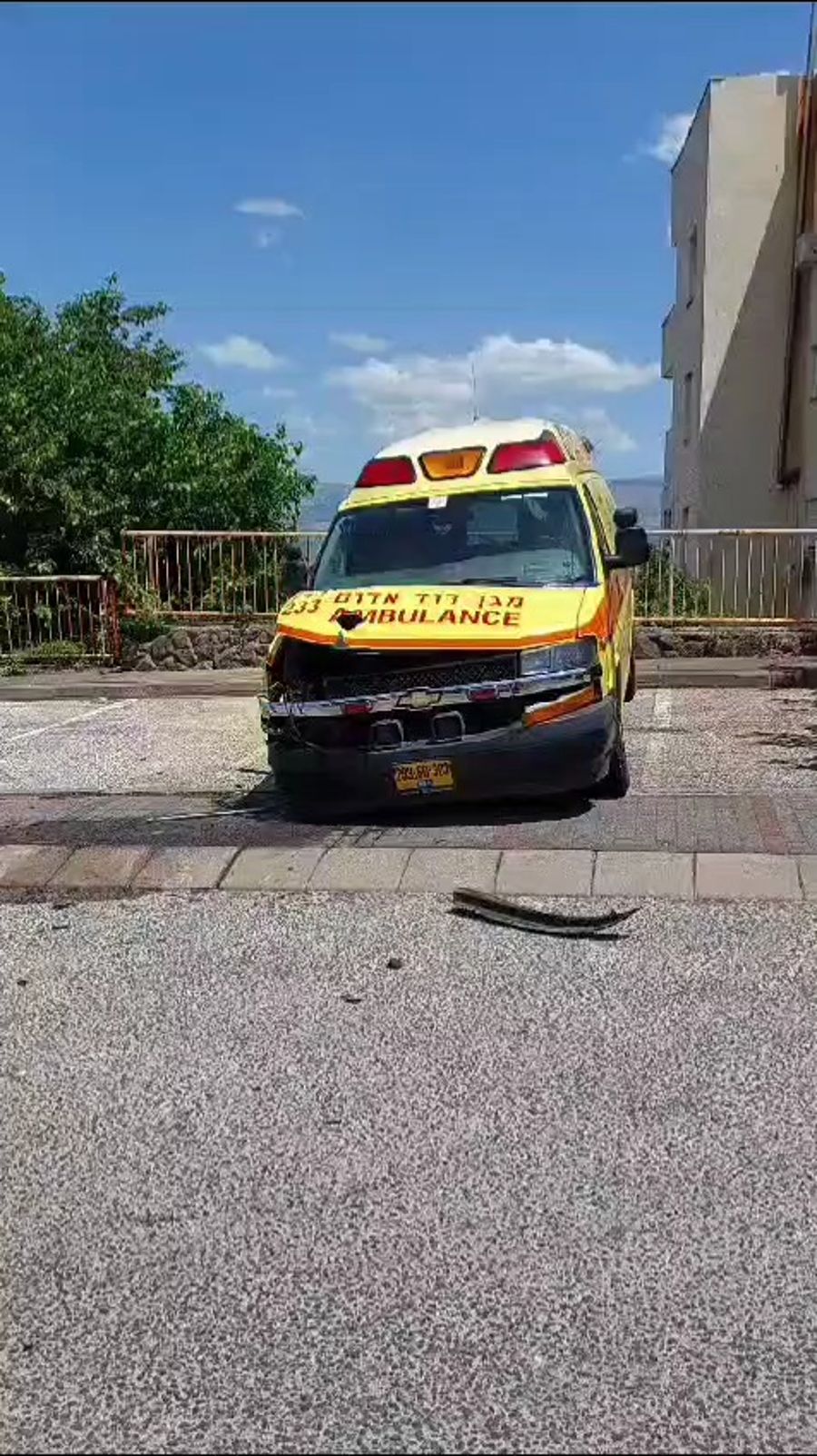 Ambulance damaged in Hezbollah rocket barrage.