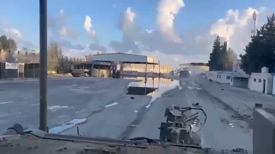 IDF troops seizing Rafah crossing.