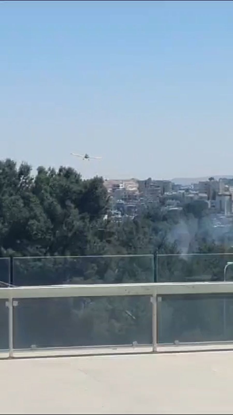 Putting out the fire, view from the Knesset.