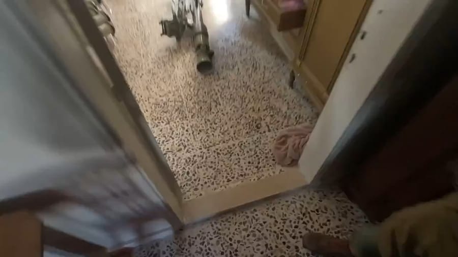 Touring a terror house.