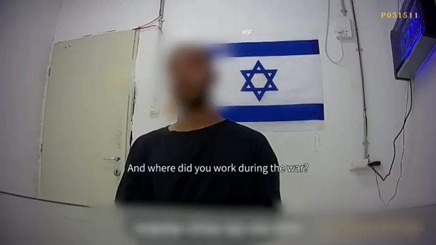 Gazan ambulance driver being interrogated.