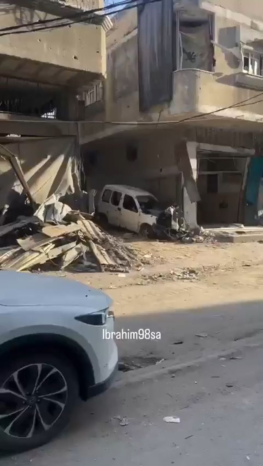 Hamas terrorists line the streets as the Red Cross hands the Israeli hostages over to the IDF