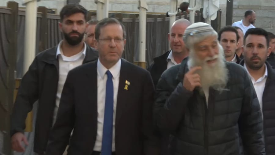 President Herzog praying at the Western Wall.