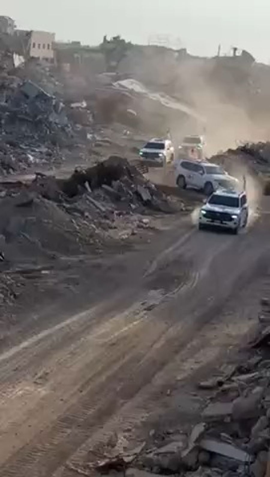 Red Cross vehicles on their way to pick up Israeli hostages