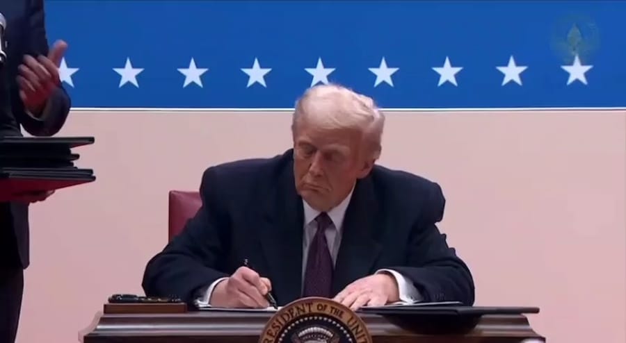 Donald Trump throwing pens to crowd