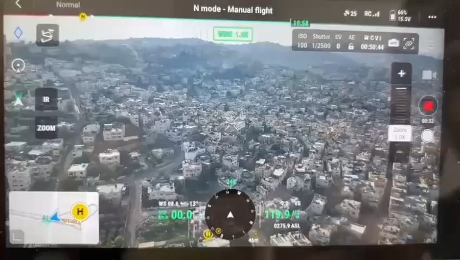 Buildings being blown up in Jenin