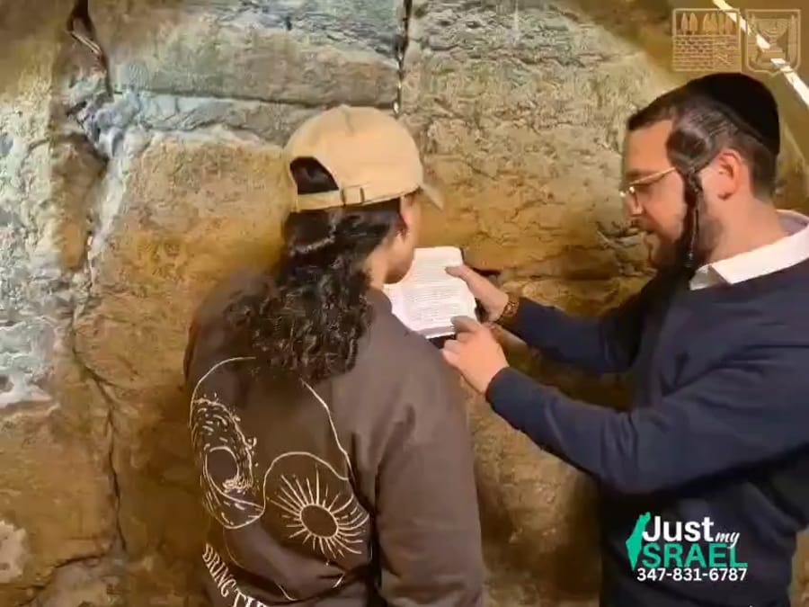 Free woman Emily Damari making the blessing of HaGomel at the Kotel (below ground).