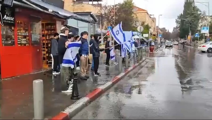 Israelis line the streets, waving flags, as they bid farewell to our slain hostages