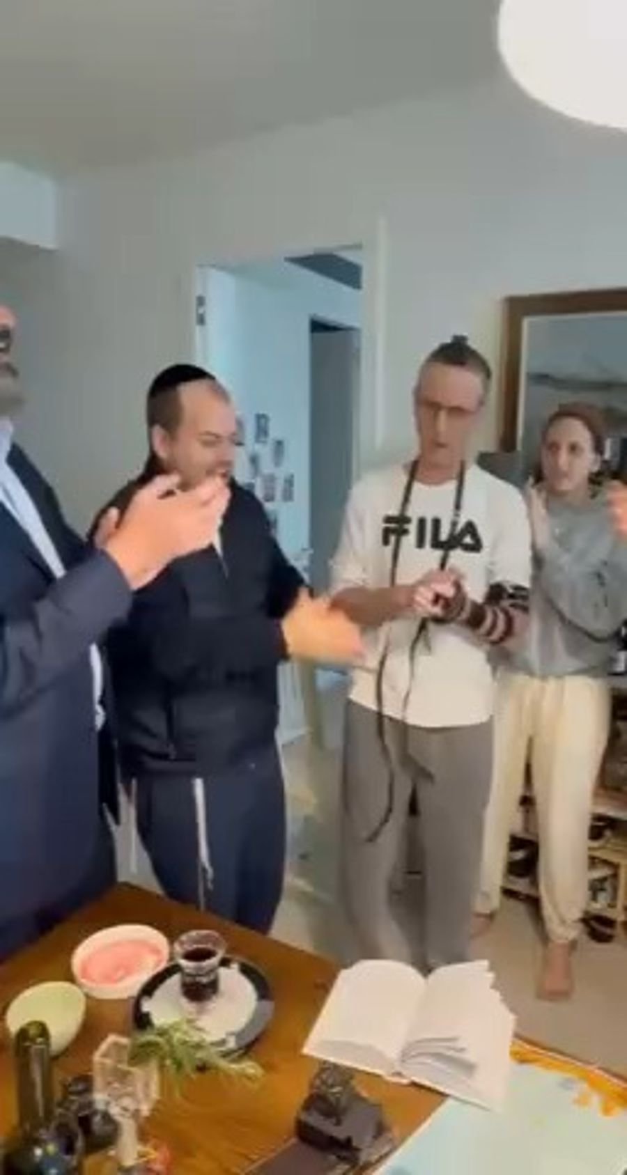 Shai Graucher hosting former hostage Ohad Ben Ami in emotional celebration