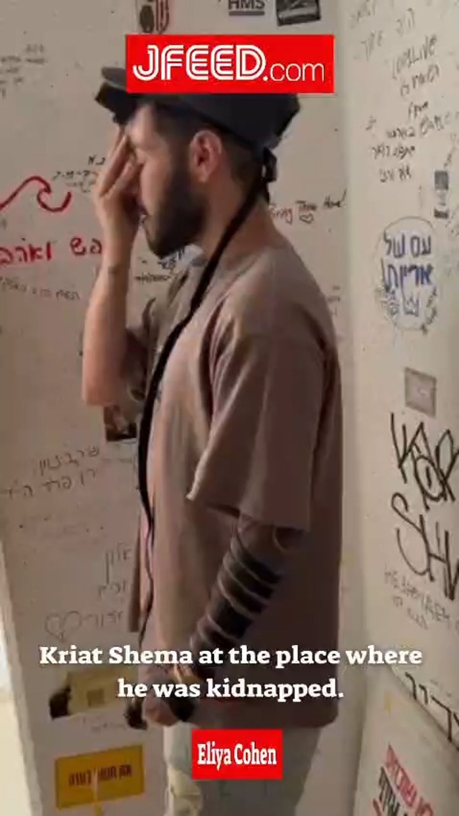 Former hostage Eliya Cohen recites the 'Shema' in the shelter he was abducted from