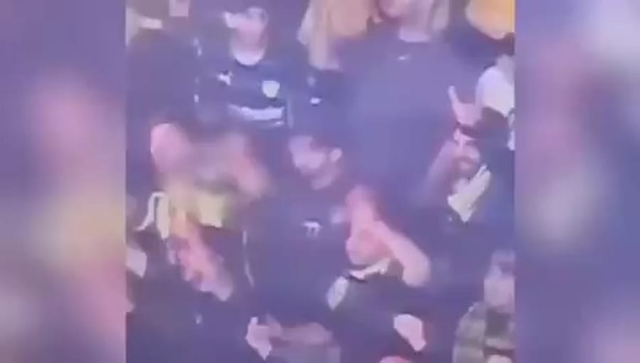 Soccer fan shooting fireworks