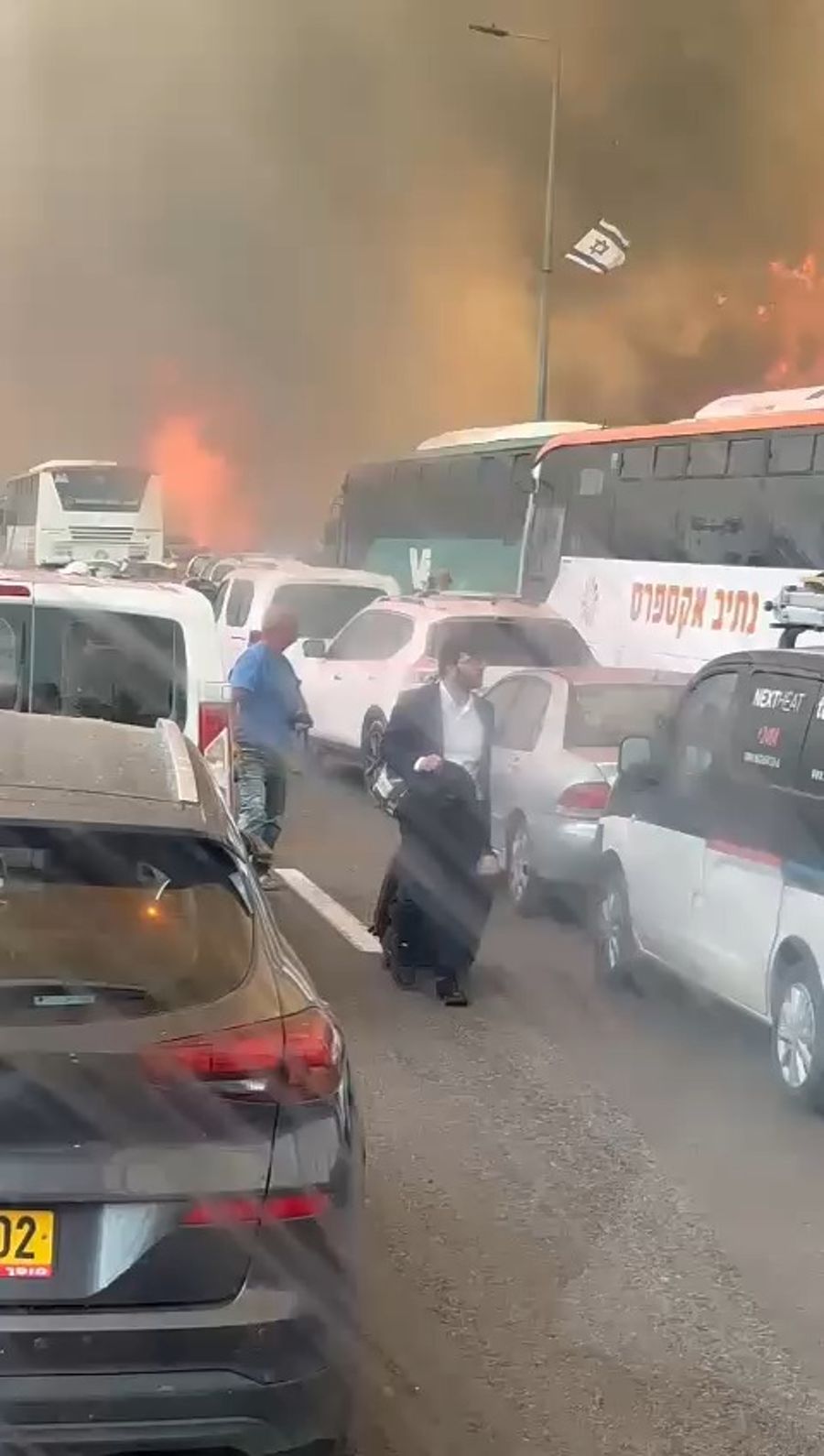 Civilians escaping as fires spread across Road 1 