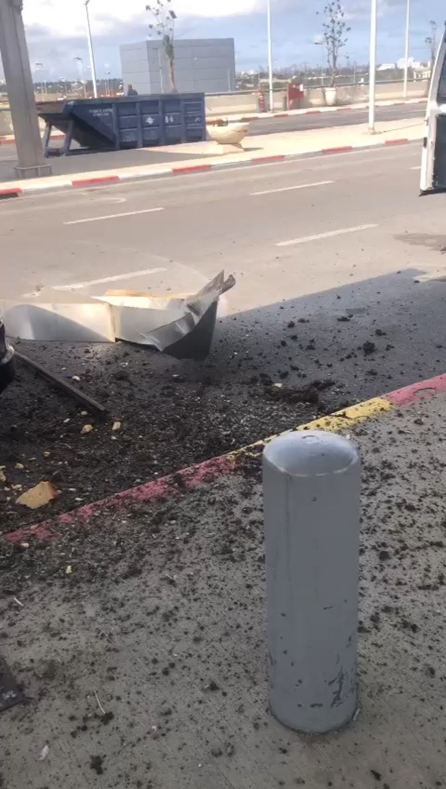 Woman in shock at scene where missile fell