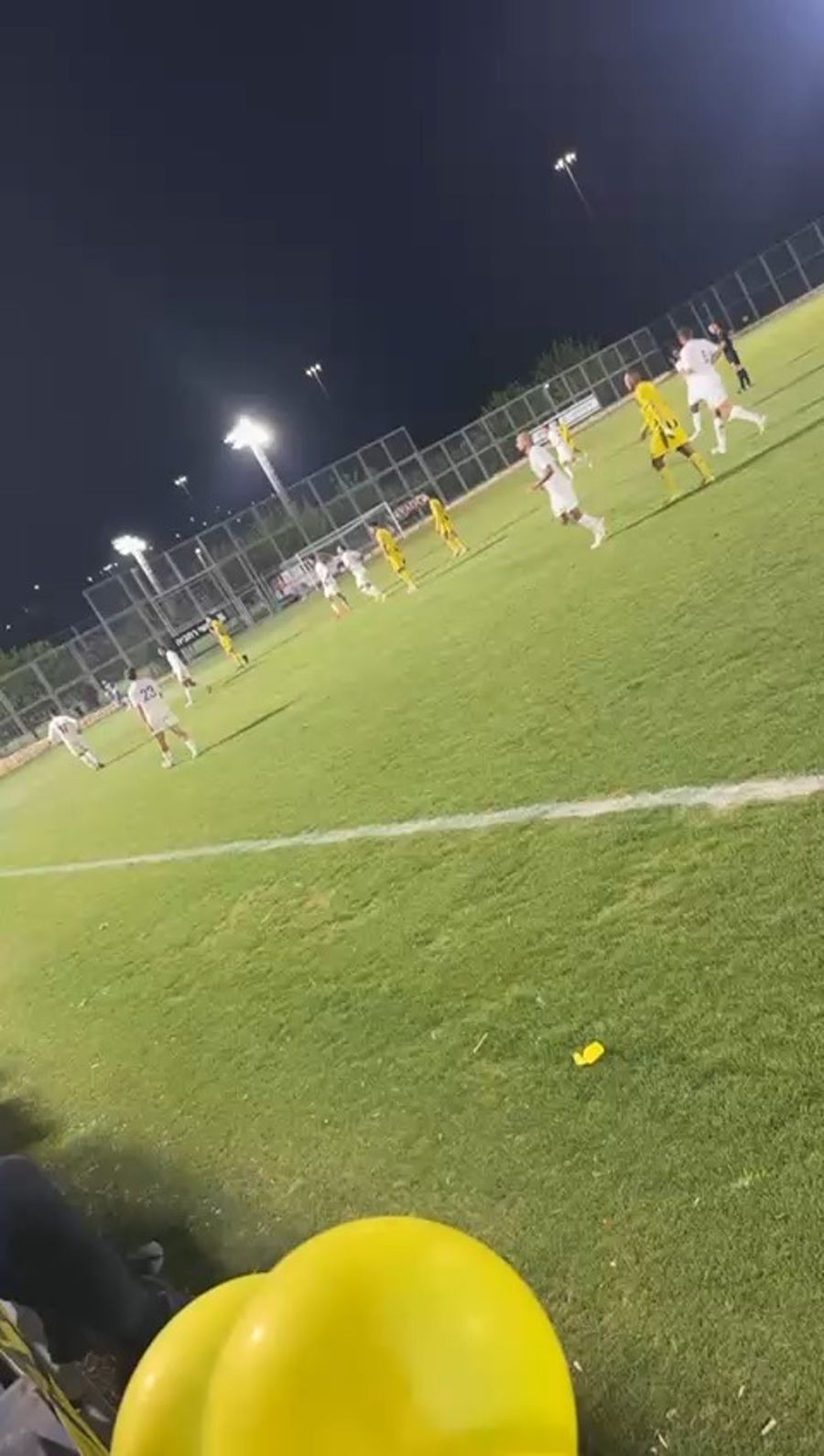 Soccer team running for shelter.