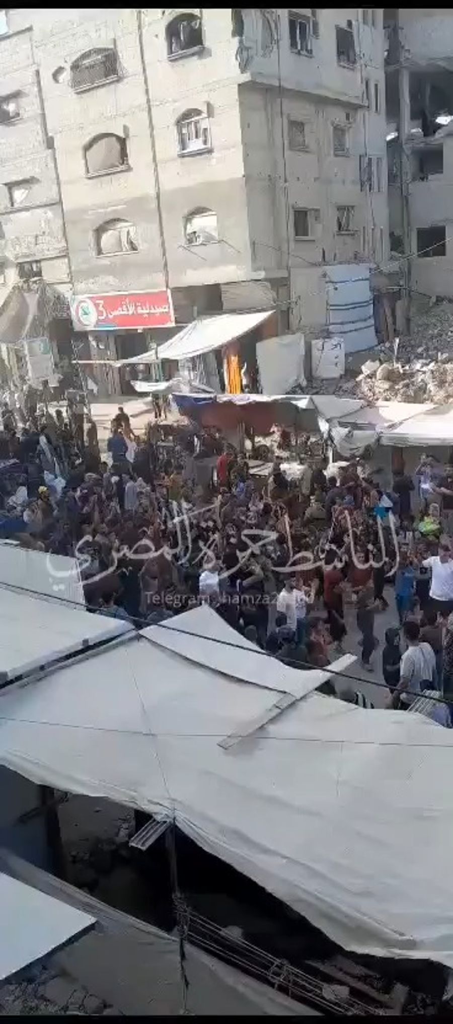 "Hamas, out, out!"