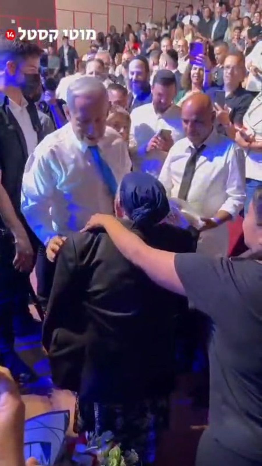 Netanyahu Removes His Jacket to Warm Elderly Woman