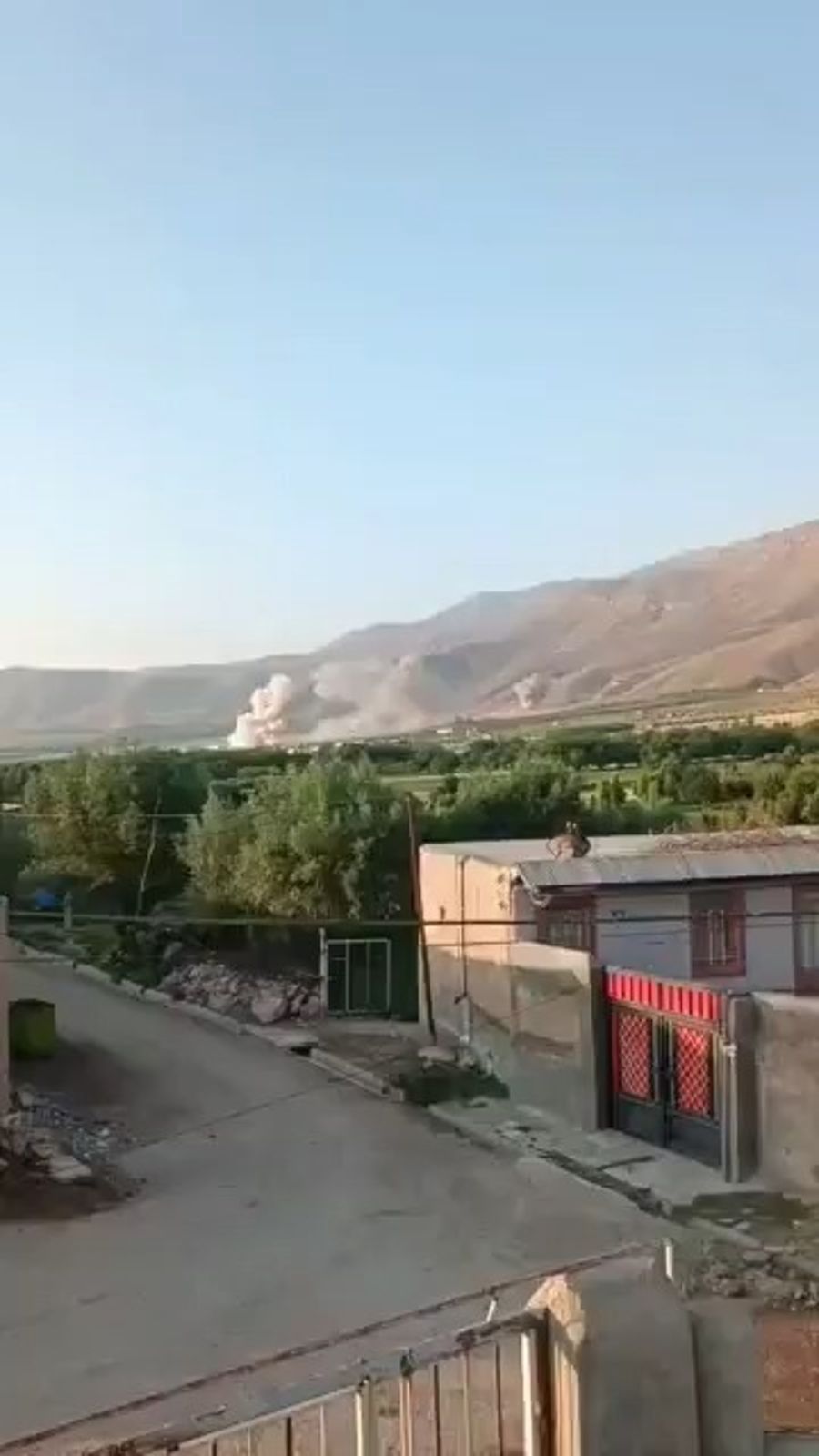 A spectacular wave of secondary explosions at a missile and military equipment warehouse that was struck in Borujerd, Iran.