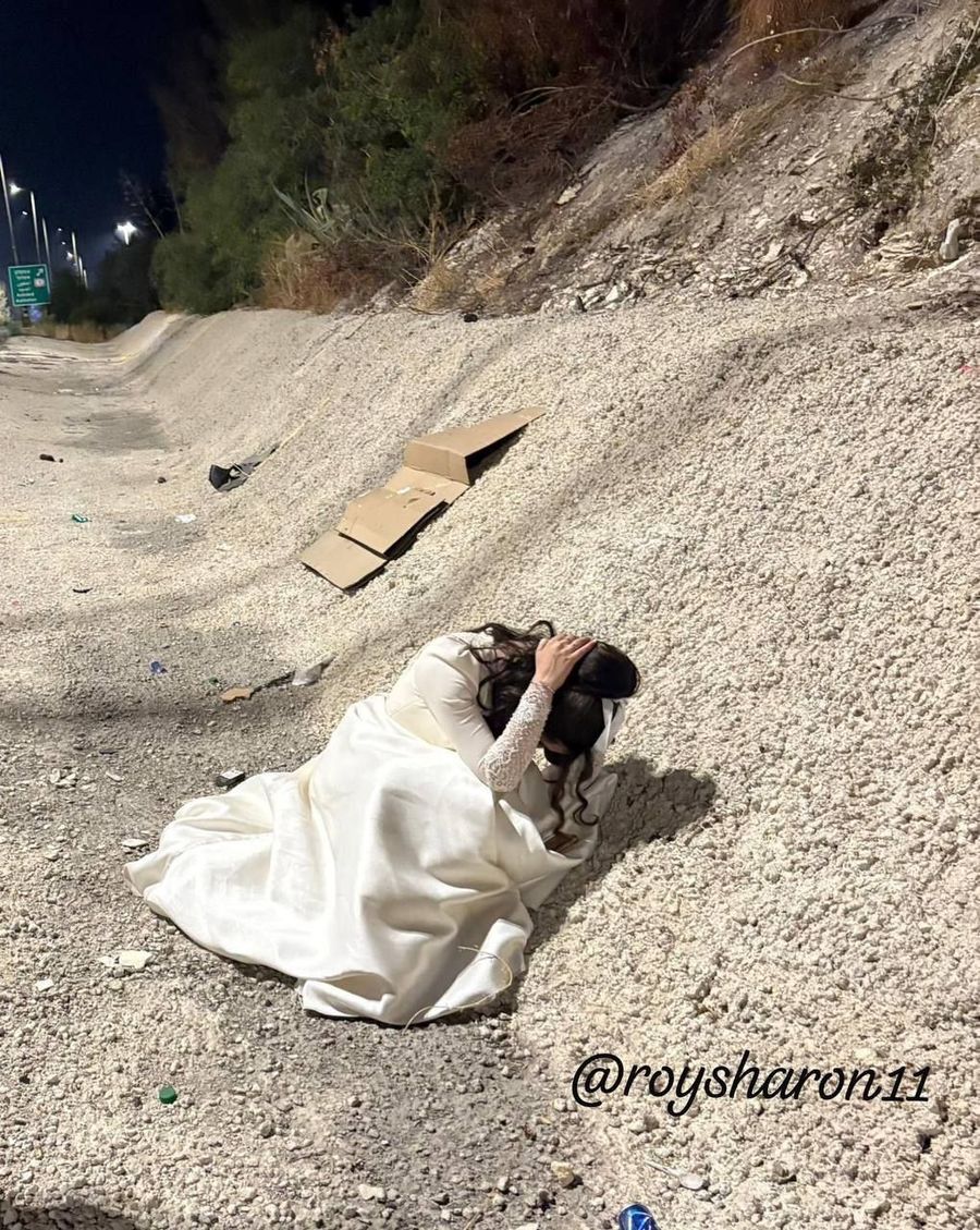 Life in Israel right now: a bride on her way to the chuppah.
