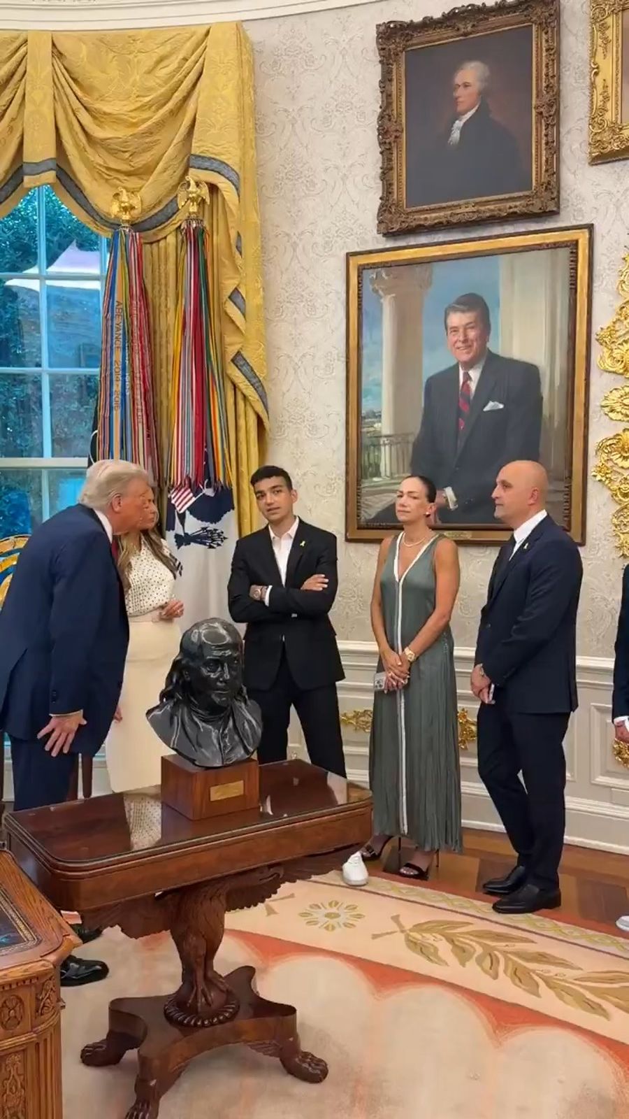 Trump and Edan Alexander.