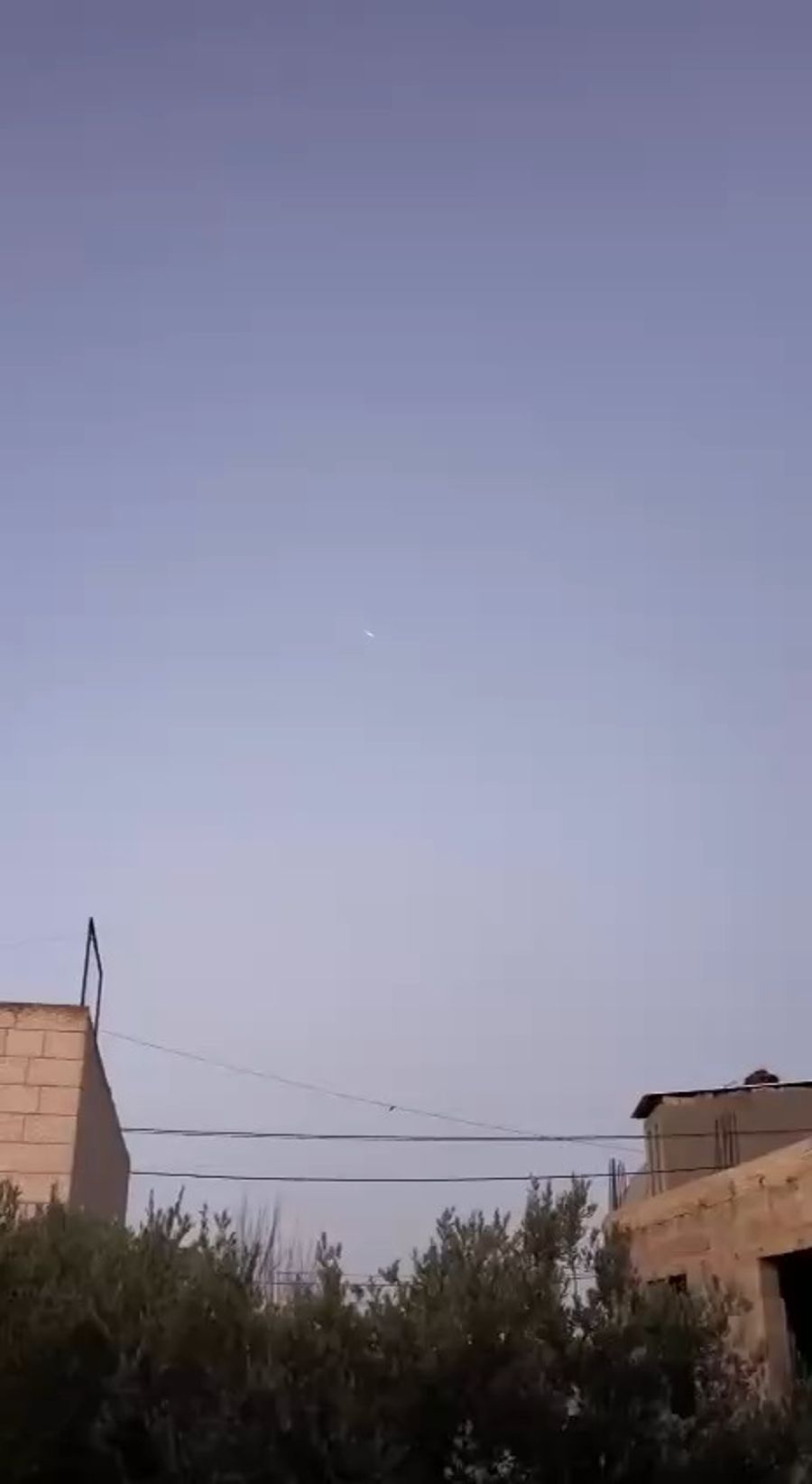 Missile exploding in midair.