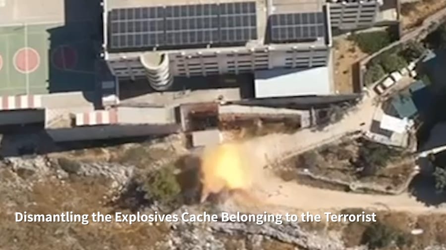 Blowing up an explosives cache.