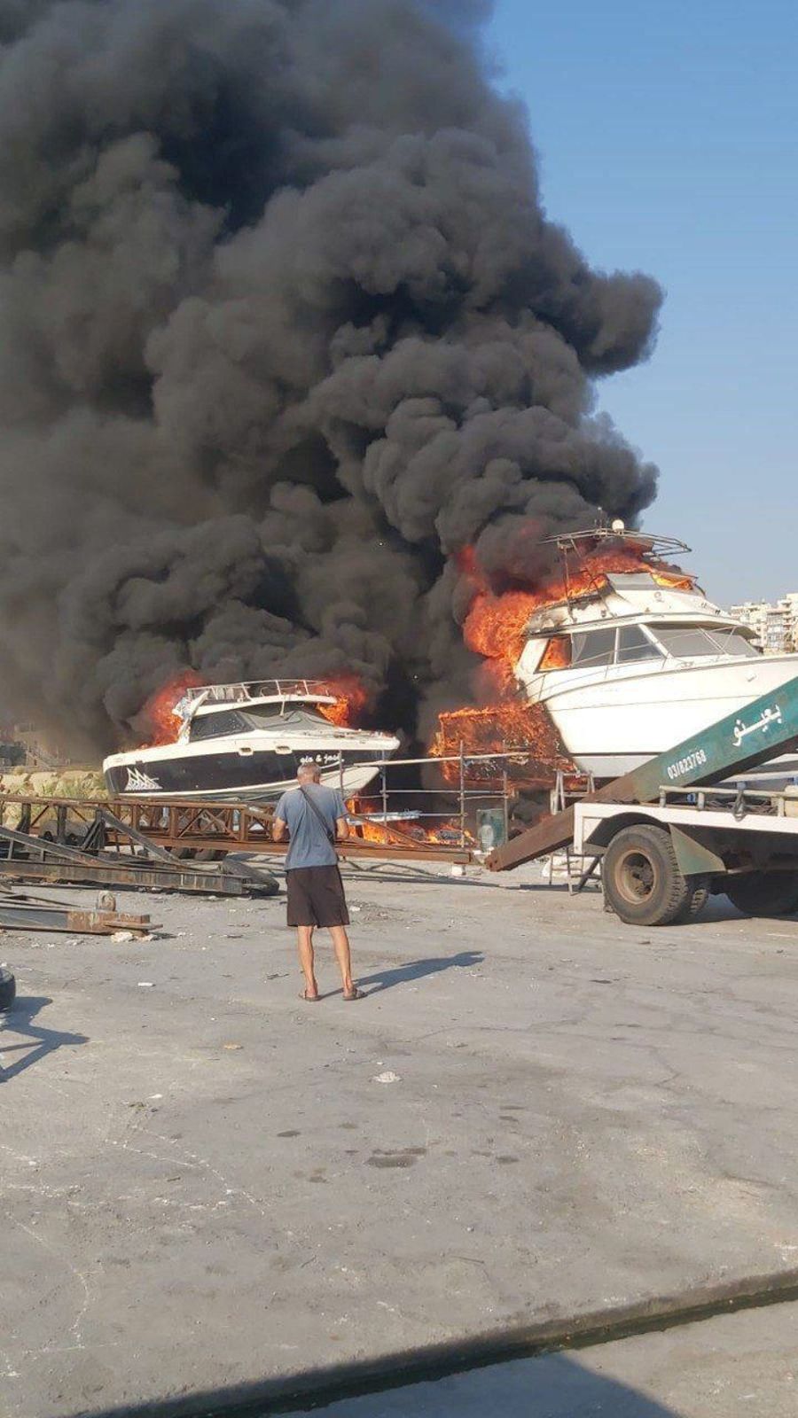 Boats catch fire near the port of Beirut