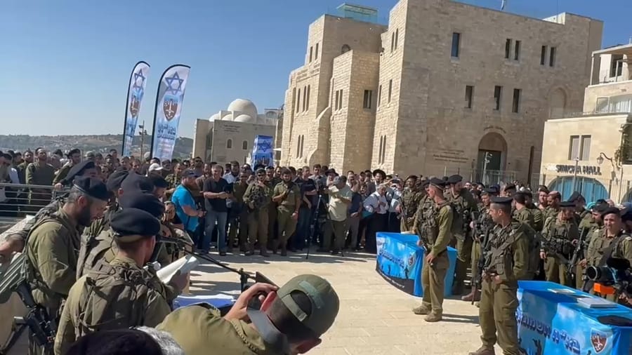 ceremony at the Kotel following beret march