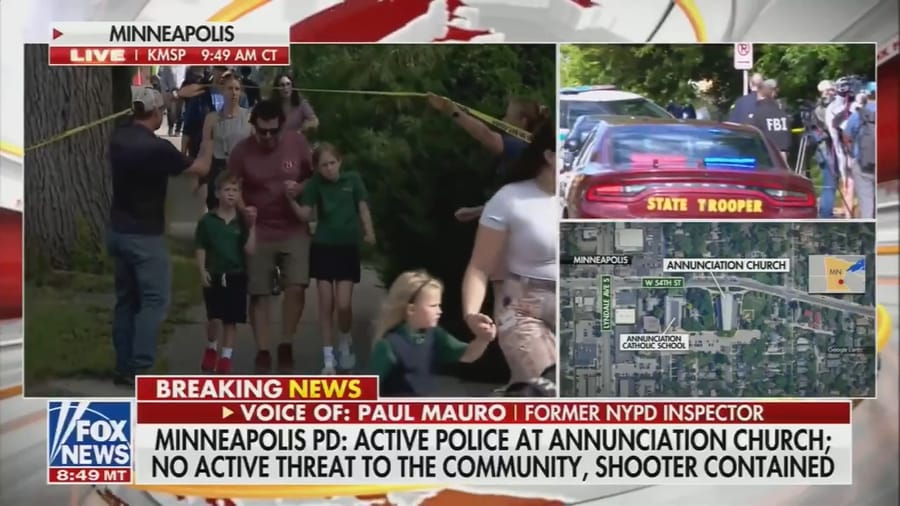 Children who had barricaded themselves in school classrooms for the past hour out of fear for their lives have now been seen being taken out of the compound.