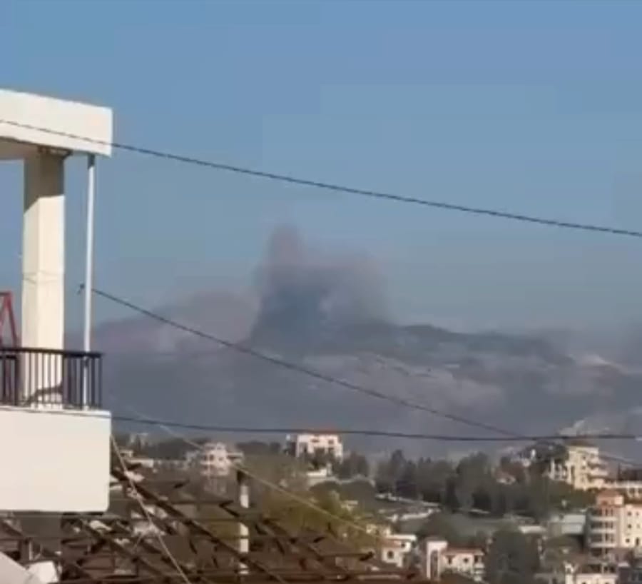 Smoke rising over Hezbollah bases in southern Lebanon after overnight strikes.