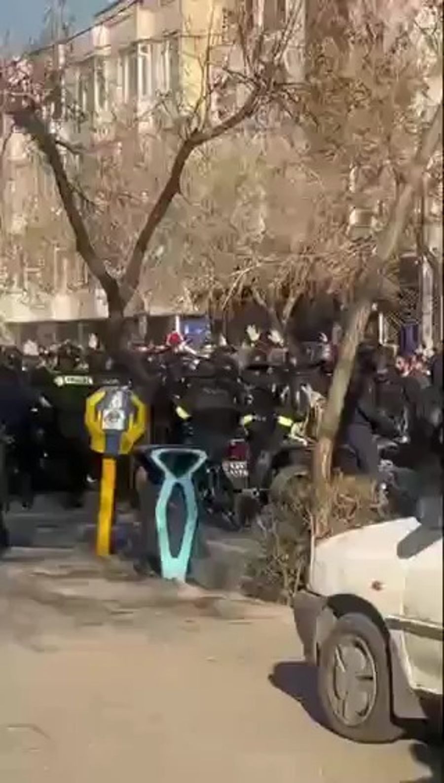 Protesters chase out regime forces, Mashad, Iran
