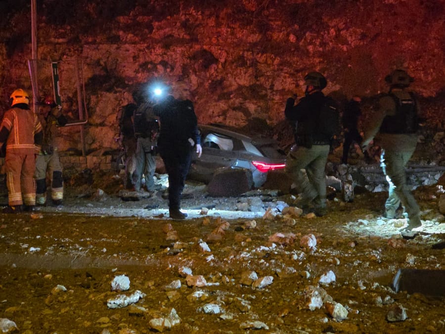 Massive piece of shrapnel lands on car while it's driving