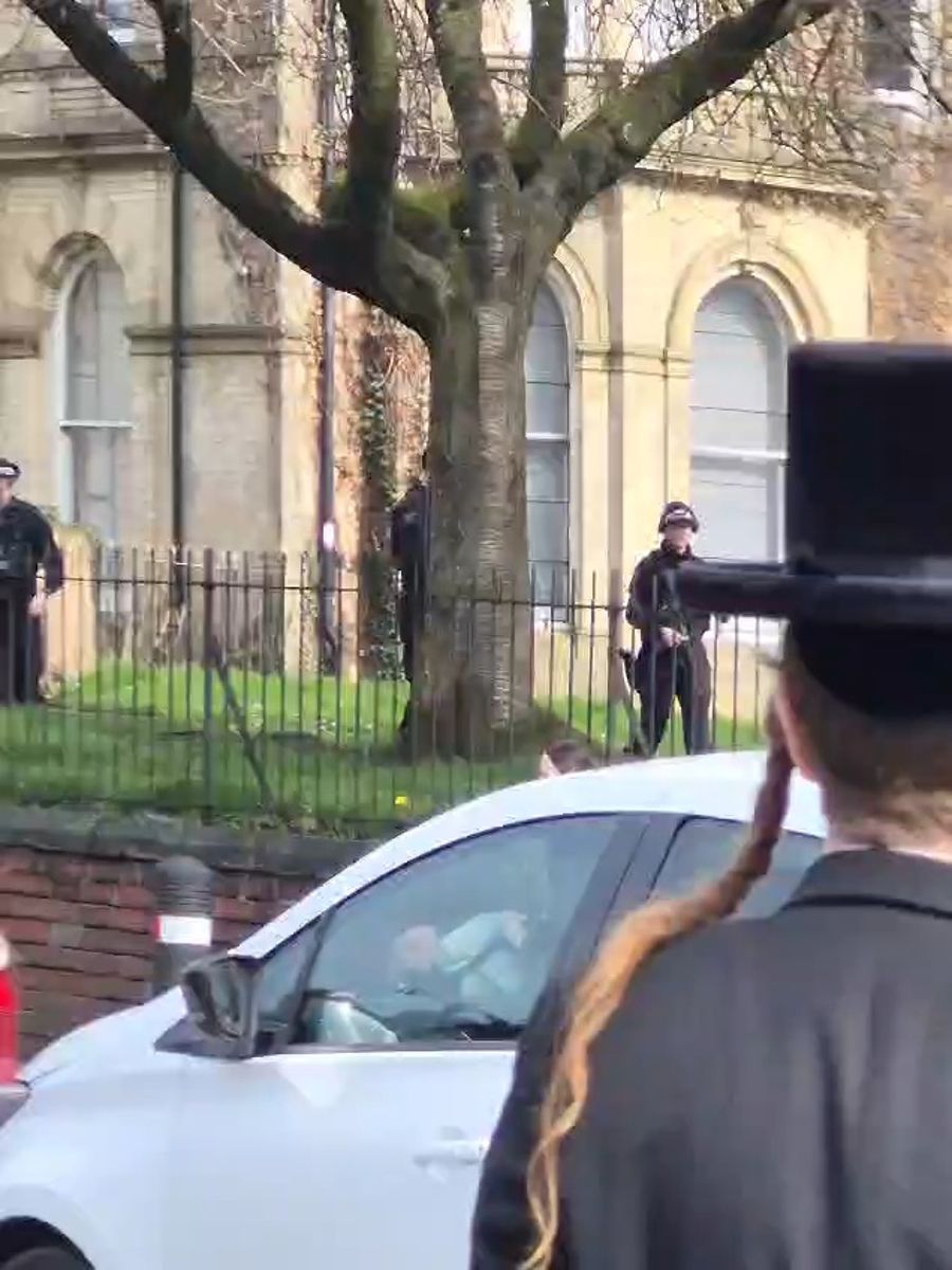 Armed Police Surround Suspect Wearing Apparent Suicide Vest in Manchester