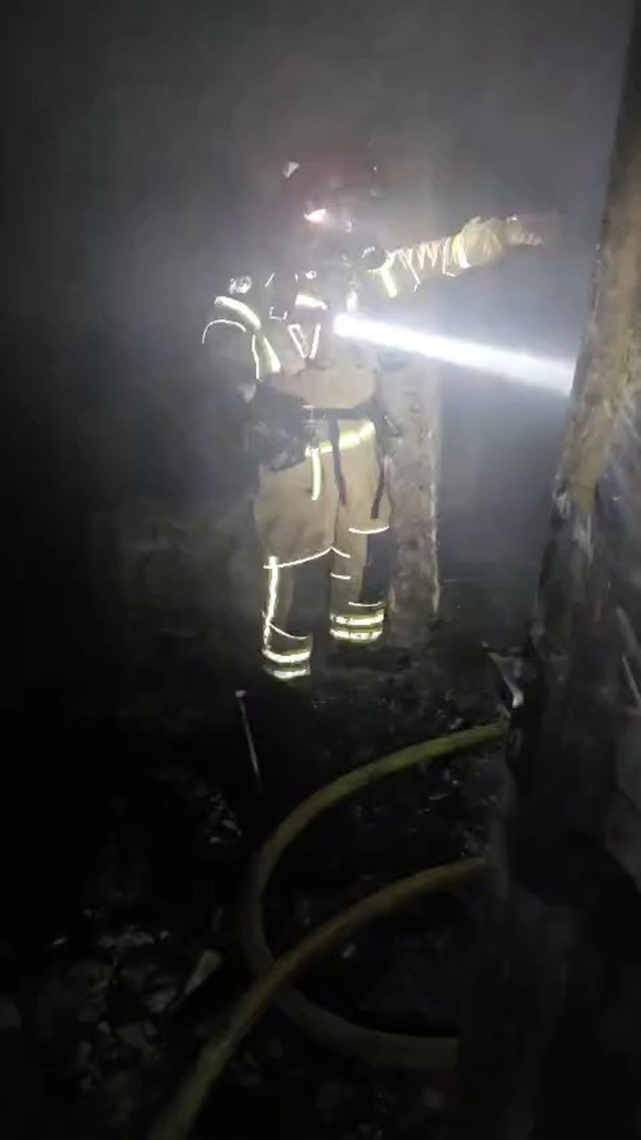 Emergency personnel search for people trapped after missile hits Arad