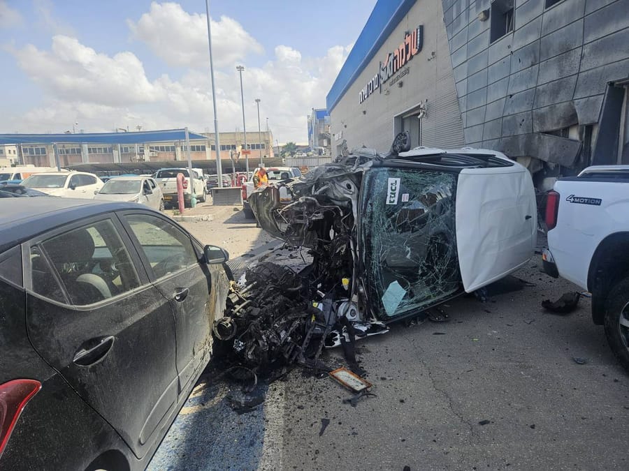 Cars damaged after submunition strikes Petach Tikva