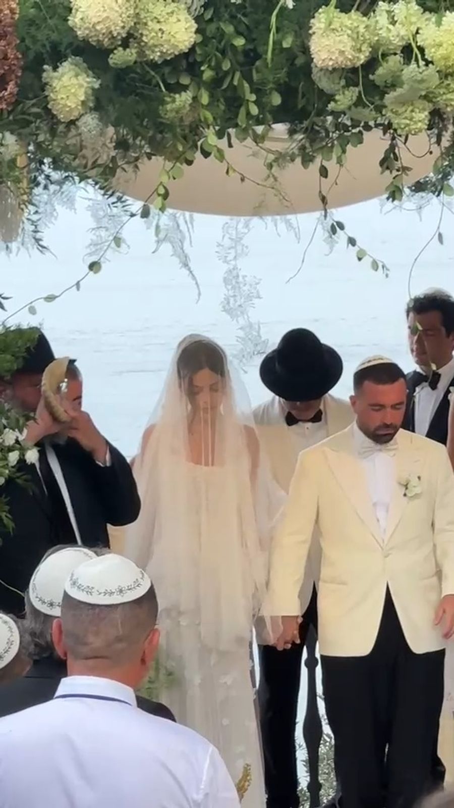 Omer and Sasha under the chuppah