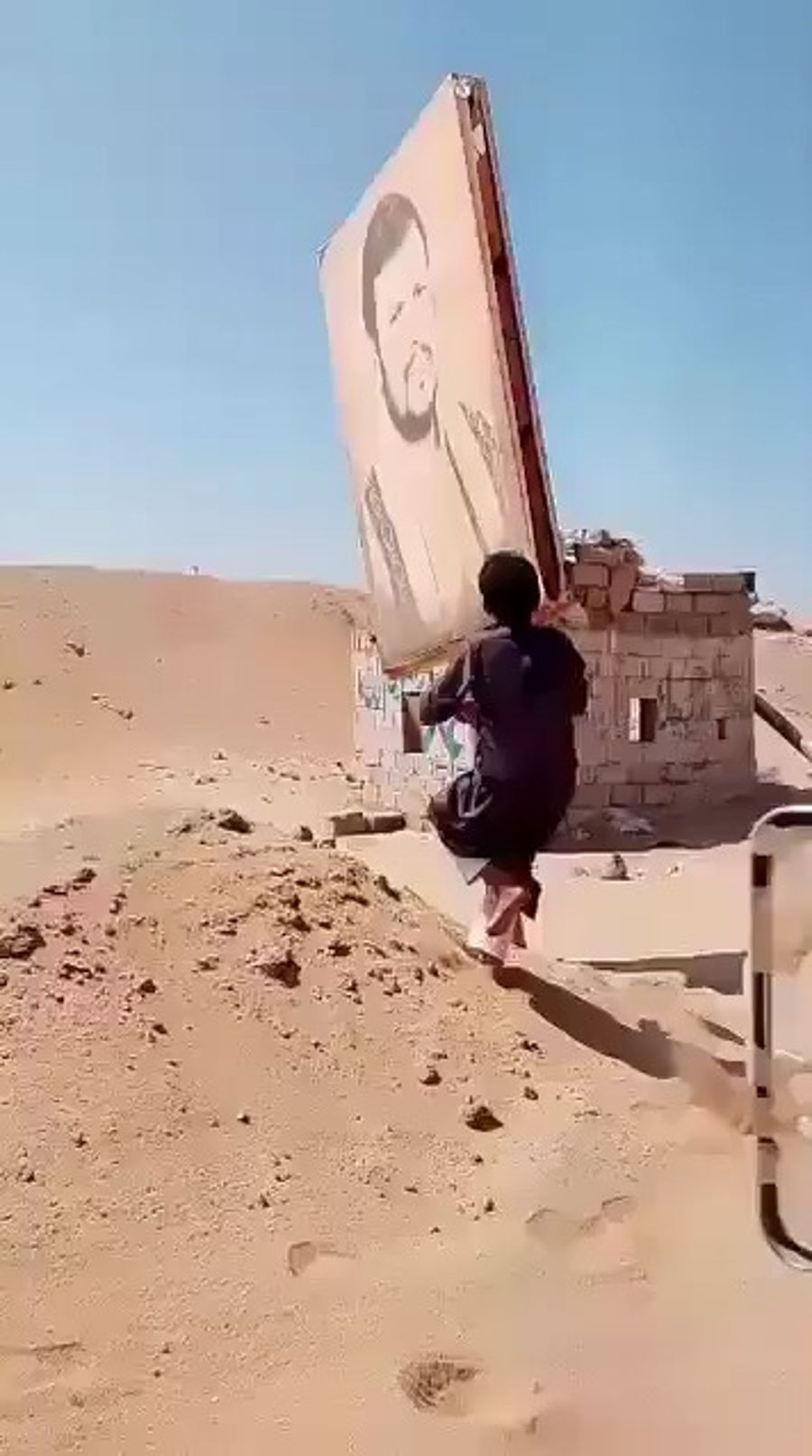 Defacement of the Houthi leader's image