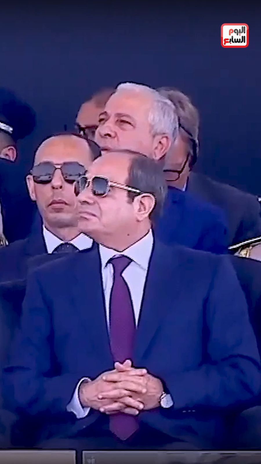 Egypt's president looks on with quiet satisfaction — a spectacular display of Sukhoi jets at the opening of the El Alamein International Airshow.