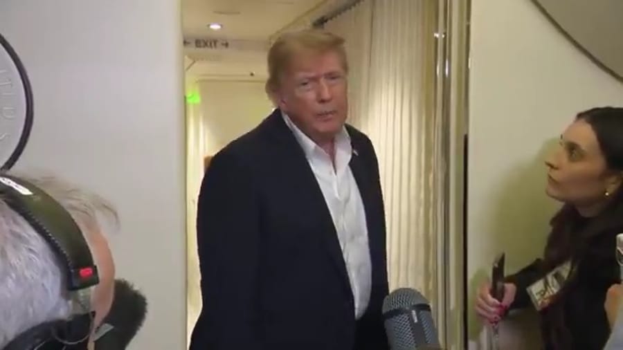 Trump aboard the aircraft