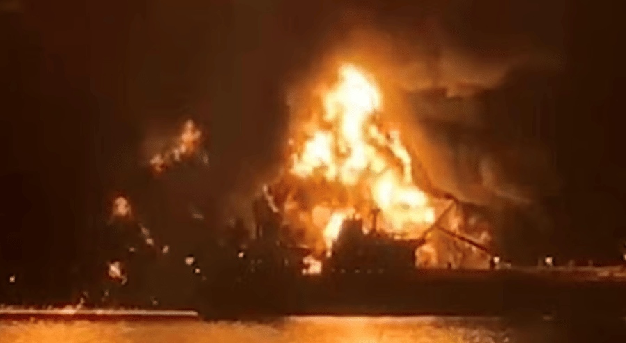 Explosion of a tanker in the Strait of Hormuz reportedly caused by Iranian mines, illustration