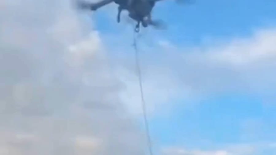 Drones drop stink bombs and eggs on migrants in Britain