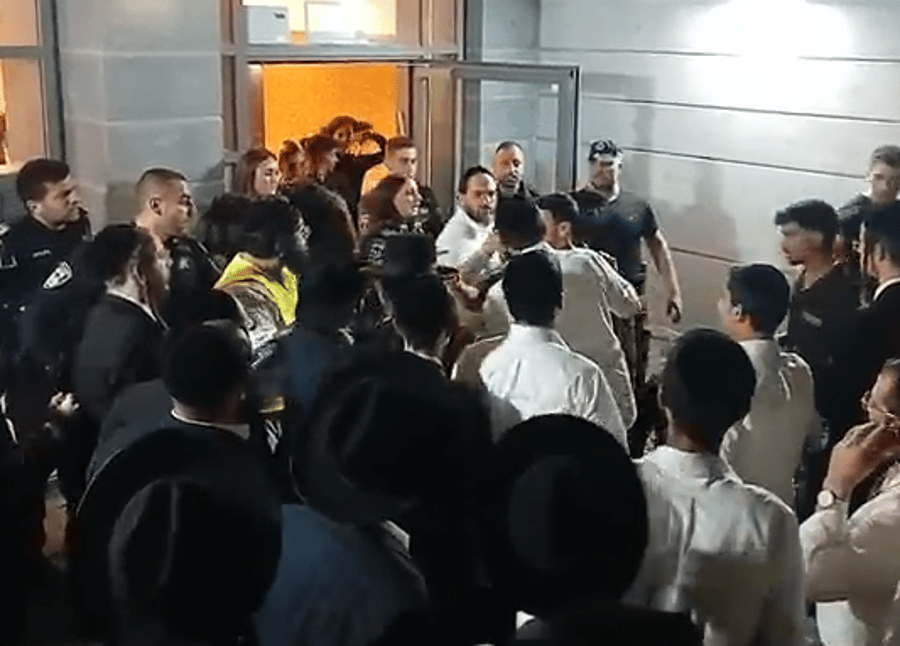 Confrontations at the entrance to the yeshiva student's building