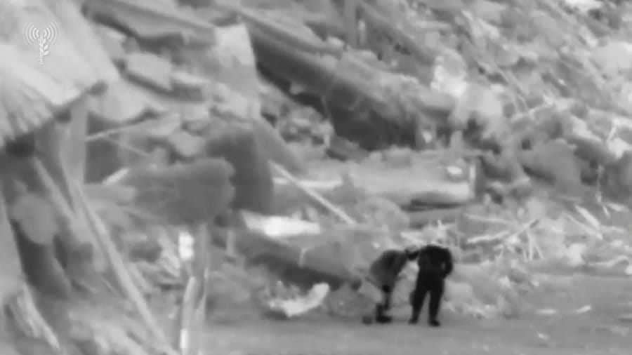 Hamas terrorists planting an explosive device outside Kamal Adwan Hospital
Photo: IDF Spokesperson
