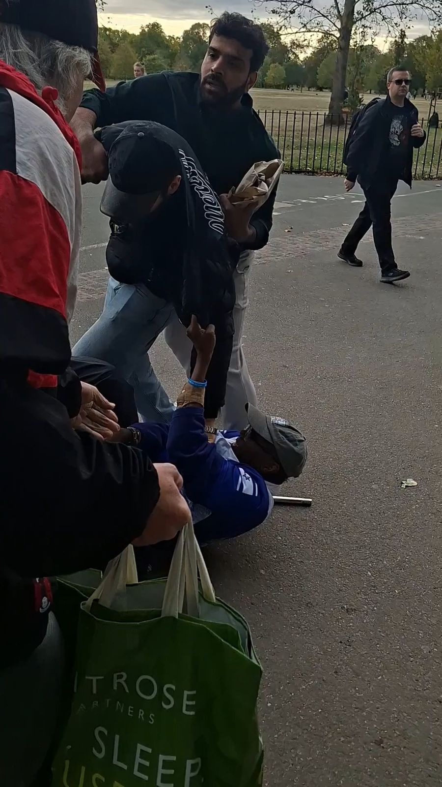 An elderly man attacked by a group of Muslims at Speakers' Corner in London for supporting Israel