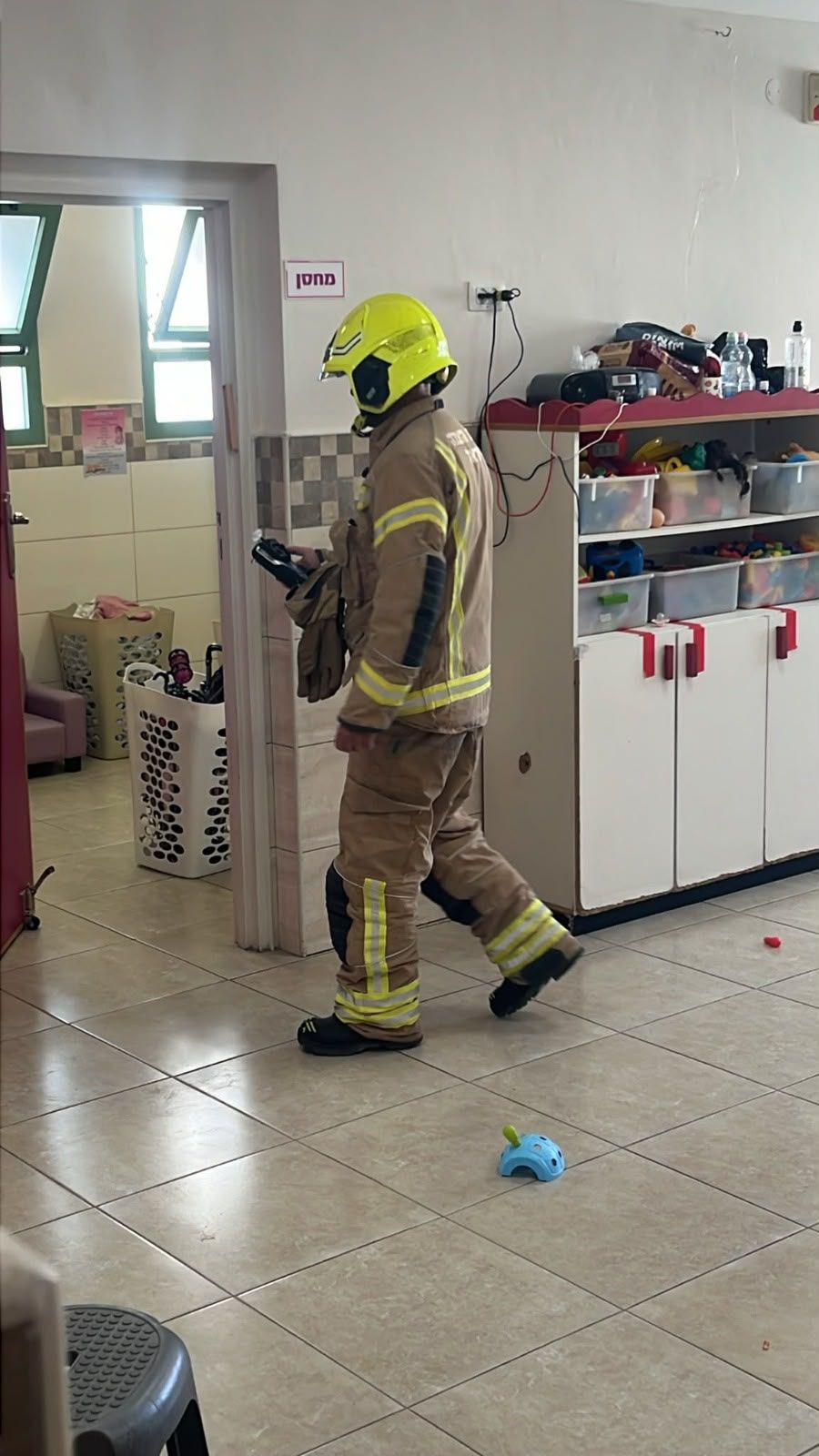 Firefighters at the daycare in Beitar Illit