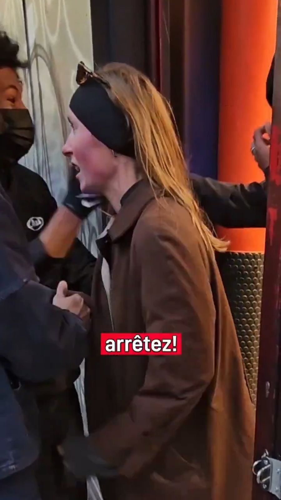 Woman pleading with looters to stop the violence