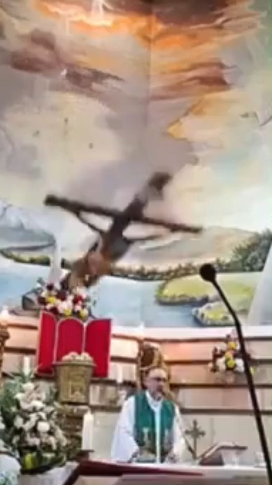 Priest killed when massive cross falls from church wall during Mass