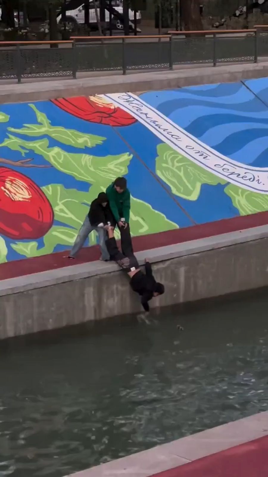 Teens dangled friend over river for Coke bottle — company's response