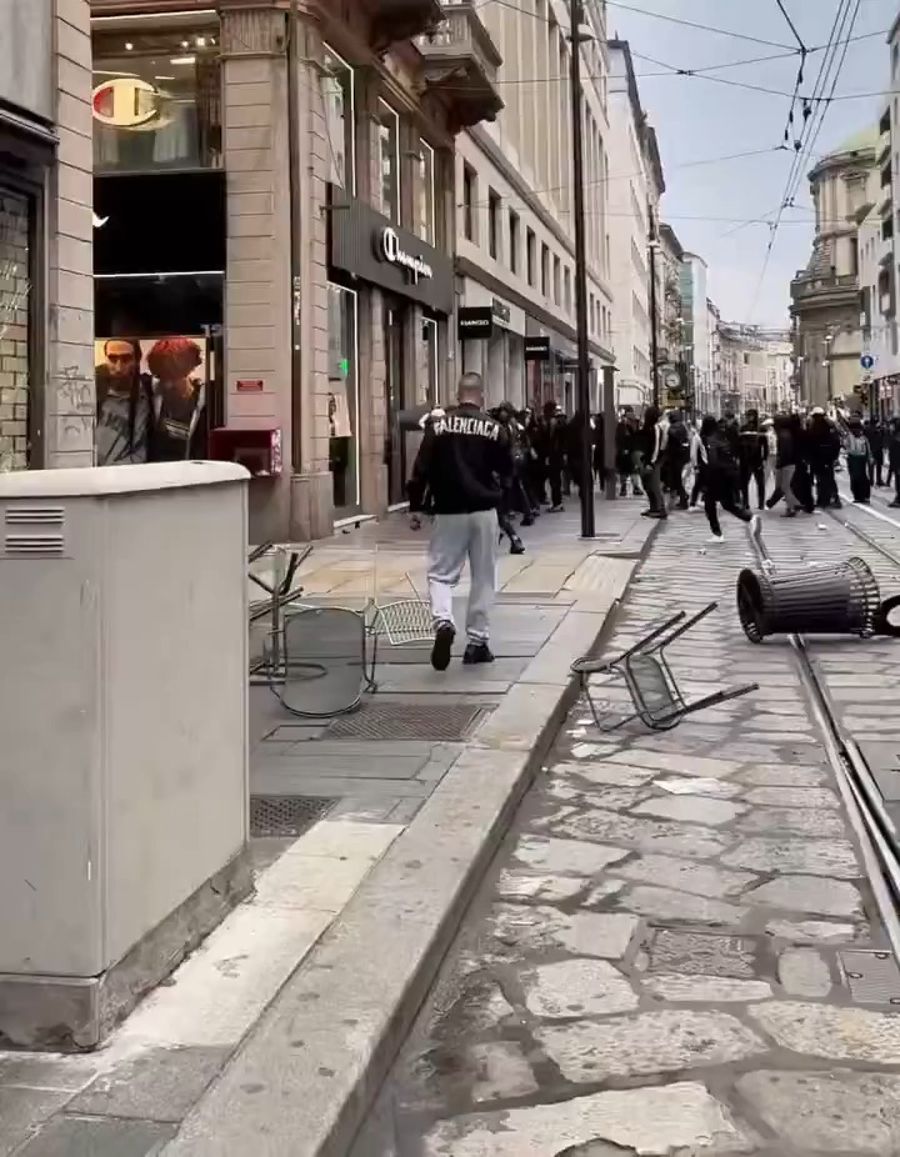 Riots in Milan: Looters ransack designer stores as protests turn violent