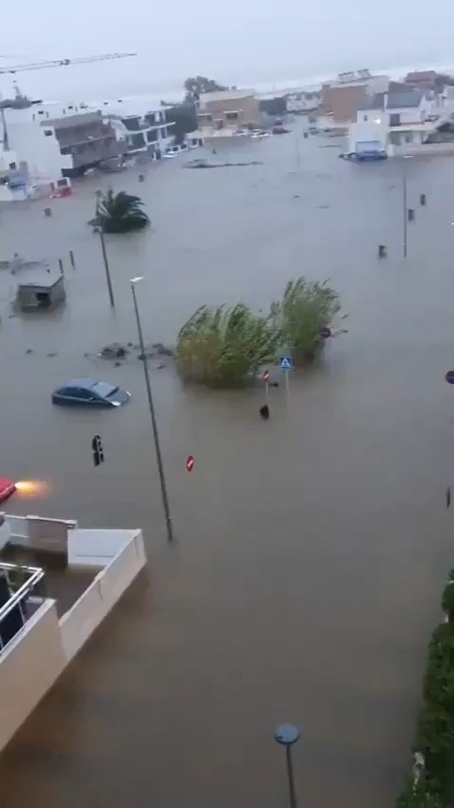Spain submerged: Storm turns neighborhoods into disaster zones, helicopters rescue children from rooftops