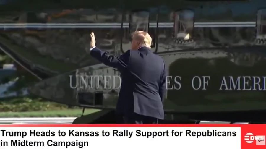 Trump waves to an imaginary crowd